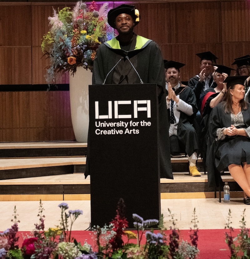 Yinka Ilori accepting his honorary doctorate at the UCA graduation ceremony. Photo by Michelle Marshall